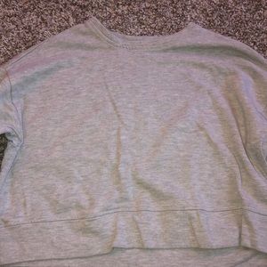 long sleeved grey shirt